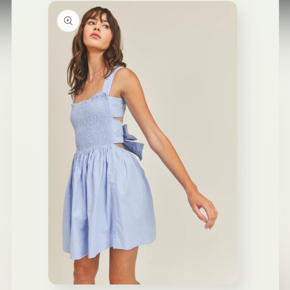 Beautiful blue open back mini dress
Size small